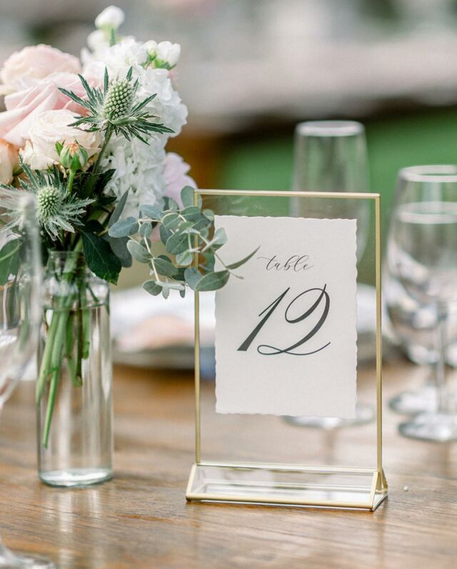 KNOW YOUR NUMBERS 

Wedding planning revolves around numbers 🤑 and while we won’t be chatting about finances today, we want to share a few tips about Table Numbers and Seating Assignments 😉 

If you’re having a seated dinner (plated, buffet, family style) in mind for your reception, consider the following:

✨Assign Tables: When guests first enter your reception they are looking for directions: “Where do I put my gift, sign in, get a drink, or put my bag?” Minimizing questions makes the transition from ceremony to reception smoother and creates a relaxed environment for your guests.

✨Get Organized: Starting with a well-organized guest list will ease the process. Have separate columns for last name, first name, table number, etc., so the list can be sorted in different ways. As your planners, we like to have copies sorted both by table number and last name for quick reference. This comes in handy for last-minute changes. When displaying escort cards, be sure to arrange them alphabetically by last name and allow plenty of space for each one to be easily seen.

✨Wedding Party First: Assigning tables for hundreds of your closest friends and family isn’t easy. Start with your wedding party. We typically see a long head table consisting of the wedding party and their dates, surrounded by a few family tables and then remaining guest tables fill the space from there.

✨Allow for Wiggle Room: The general rule for no-shows and extras is plus or minus 10 percent. A 60-inch round table seats 8 to 10 guests comfortably, depending on the type of chair and use of charger or not. A six-foot rectangle table seats 6 or 8 -if using the ends. Each table does not have to have the same number, to begin with. You’ll set up based on the “final” list and be prepared for changes. Be sure there is a 5 percent overage for all rentals needed to set the table.

✨Be Flexible: There will always be last-minute changes, no-shows, and extras. Coming to terms with this from the beginning will help your stress level. Call it “final” a week to three days before the wedding and leave any remaining changes to your wedding planner to handle.

Have questions? Ask away! ☺️