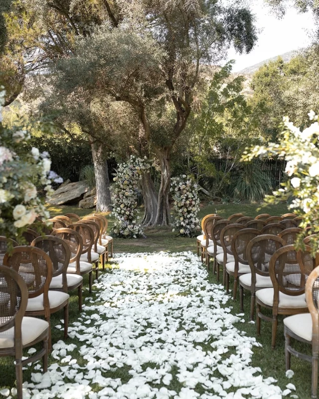 Your aisle isn’t just a walkway—it’s the moment before “the” moment. Let it bloom with purpose.
⠀⠀⠀⠀⠀⠀⠀⠀⠀
Aisle florals are more than just décor—they frame your walk, set the tone for your ceremony, and become part of the story told in every photo.
⠀⠀⠀⠀⠀⠀⠀⠀⠀
Two pro tips to elevate your aisle design:
	1.	Think in layers. Mix heights, textures, and tones to create a floral path that feels lush and intentional—without blocking your dress.
	2.	Repurpose with purpose. Design aisle florals that can be seamlessly moved to the reception, like around your sweetheart table or stage front. Beautiful and budget-savvy.
⠀⠀⠀⠀⠀⠀⠀⠀⠀
Every detail counts—and we’re here to ensure no petal is out of place.
⠀⠀⠀⠀⠀⠀⠀⠀⠀
Planning a wedding that feels like you? Let’s design your moment, your way. Inquire via link in bio.
⠀⠀⠀⠀⠀⠀⠀⠀⠀
VENDOR TEAM
Planning & Design: @hllovely
Photography: @gracekalil_photography
Floral Design: @heavenly_blooms
Live Music: @twotownsent
Photobooth: @picmephotobooth
DJ: @redcarsounds
BTS Content Creator: @thebtsbride
Ceremony Gown: @shop_cinq
Rentals: @mtb_event_rentals
Lighting: @arentalconnection
Cake: @fantasyfrostings
Ice Cream: wanderlustcreamery
Boba:@yifang_taiwanfruittea_glendale
Beauty: @tingmakeup
Stationery: @littlecarabaostudio
Live Painter: @chasinglinen
Venue: @hummingbirdnestevents
Catering: @treslagroup
Officiant: @alexanderofficiants
⠀⠀⠀⠀⠀⠀⠀⠀⠀
#hllovely #WeddingDesign #hummingbirdnestranch #socalwedding #californiaweddings #californiaweddingvenue #socalbride #socalbrideblog #OTMbride #overthenmoon #otmexclusive #otmdirectory #weddingplanner #luxuryweddingplanner #aisleflowers #ceremonydesign #weddingdetails #weddingflorals